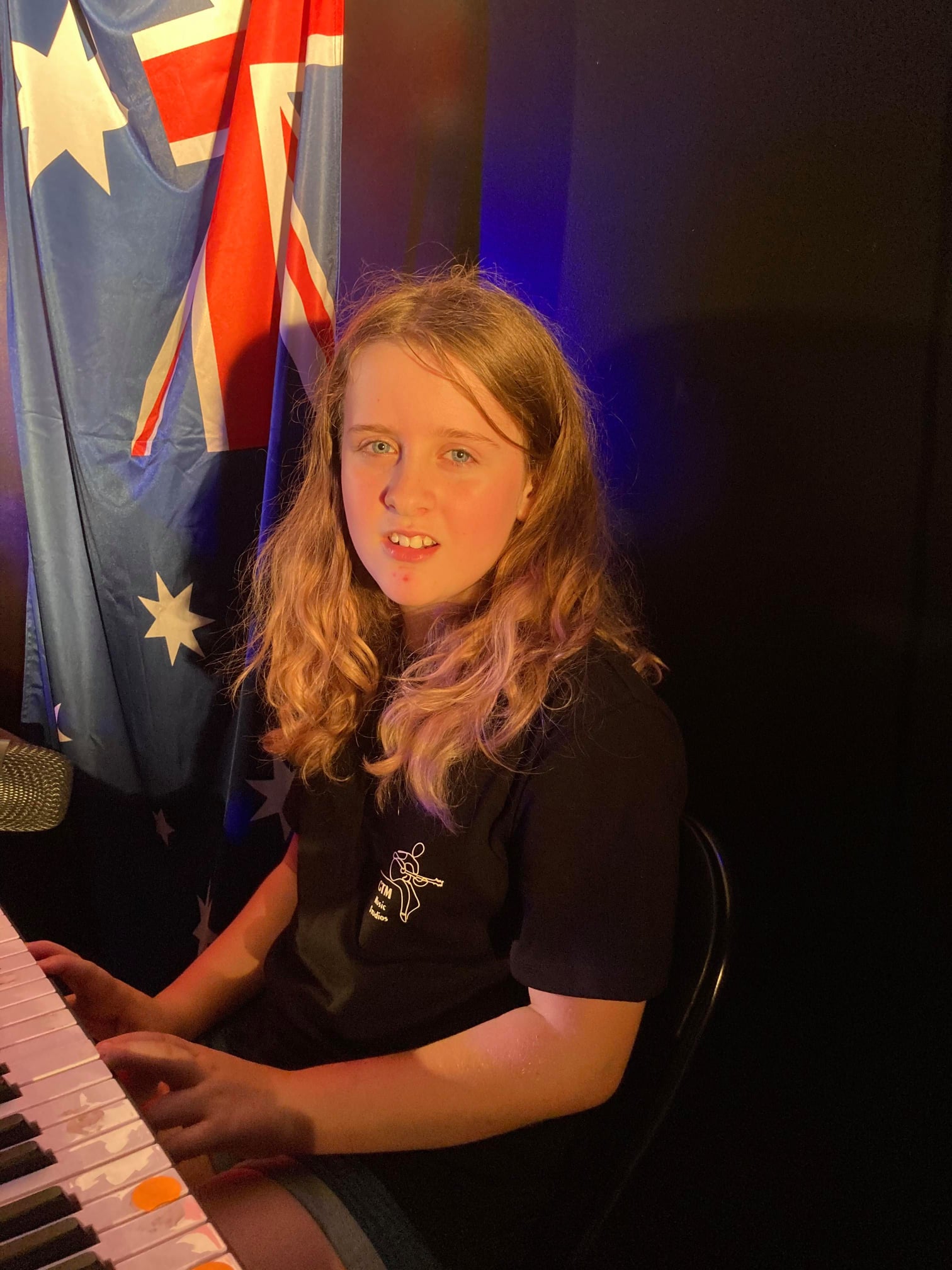 Young girl playing the keyboard