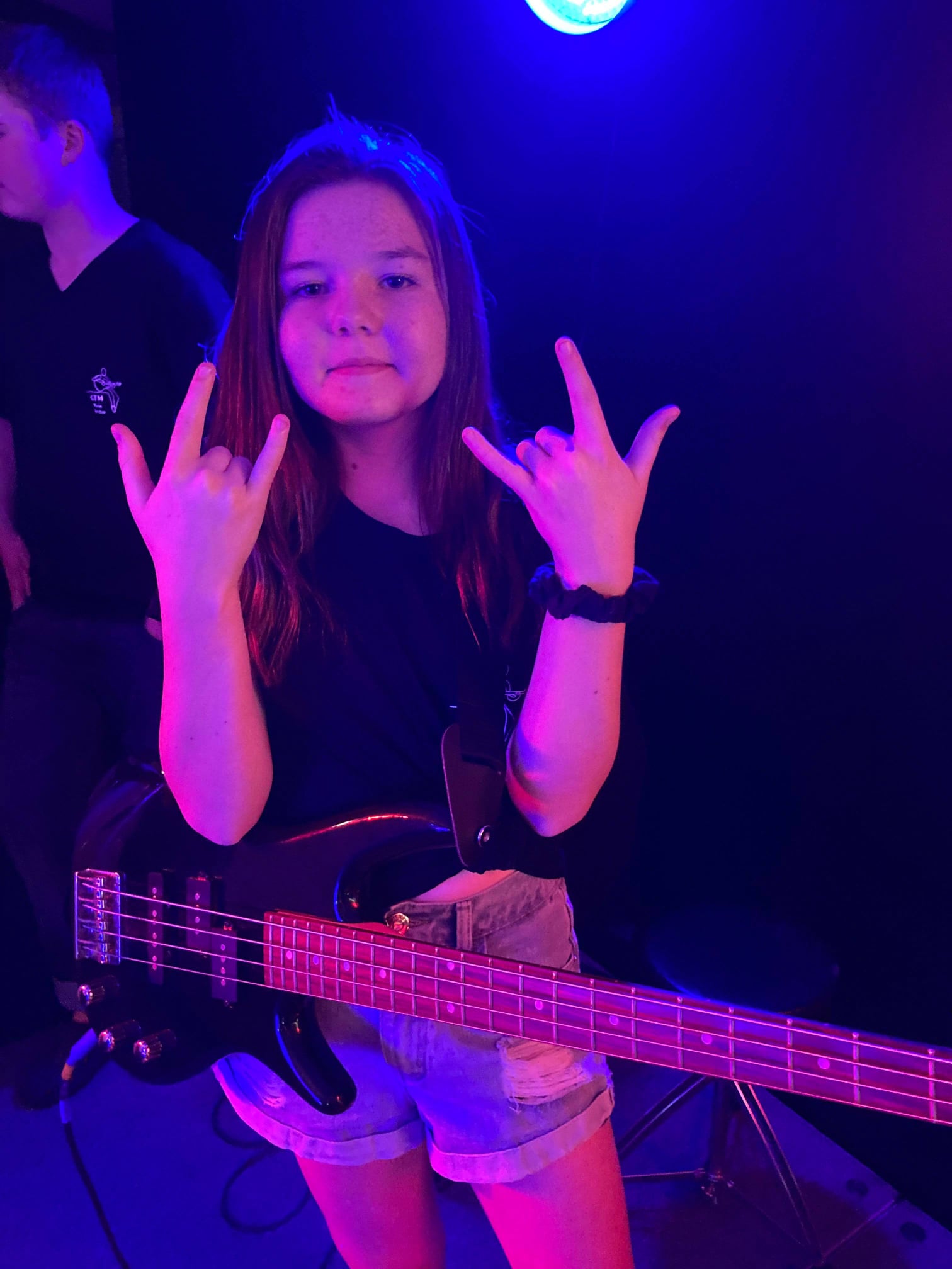 Young girl with electric guitar